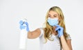 Care your health. woman in respirator mask use hand sanitizer. girl in rubber gloves spray with cleaner detergent