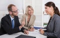 Career and candidate: three people sitting in a job interview for a management position. Royalty Free Stock Photo