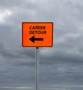 Career Detour construction sign with arrow and cloudy sky