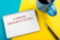 Career opportunities. Office desk table with notepad, pencil and coffee cup. Top view. Royalty Free Stock Photo