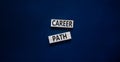 Career path symbol. Concept words Career path on wooden blocks on a beautiful black table black background. Business Career path Royalty Free Stock Photo