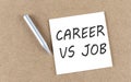 CAREER VS JOBS text on sticky note on a cork board with pencil