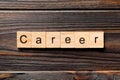 Career word written on wood block. Career text on wooden table for your desing, Top view concept Royalty Free Stock Photo