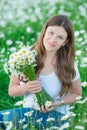 Carefree adorable girl lady woman with bouquet in fairy field of chamomile. Summer freedom enjoy concept Royalty Free Stock Photo