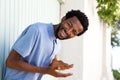 Carefree african american man laughing outside Royalty Free Stock Photo