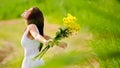 Carefree attractive girl in field