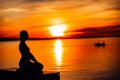 Carefree calm woman meditating in nature.Finding inner peace.Yoga practice.Spiritual healing lifestyle.Enjoying peace,anti-stress Royalty Free Stock Photo
