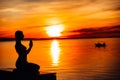 Carefree calm woman meditating in nature.Finding inner peace.Yoga practice.Spiritual healing lifestyle.Enjoying peace,anti-stress Royalty Free Stock Photo