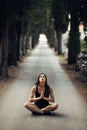 Carefree calm woman meditating in nature.Finding inner peace.Yoga practice.Spiritual healing lifestyle.Enjoying peace,anti-stress