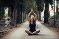 Carefree calm woman meditating in nature.Finding inner peace.Yoga practice.Spiritual healing lifestyle.Enjoying peace,anti-stress Royalty Free Stock Photo