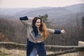 Carefree candid portrait, arms extended, young Caucasian woman girl Royalty Free Stock Photo