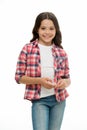 Carefree and casual. Girl cute checkered shirt and denim pants looks happy cheerful. Child girl happy carefree enjoy Royalty Free Stock Photo