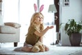 Carefree child catching soap bubbles in living room Royalty Free Stock Photo