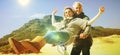 Carefree couple going on a bike ride on the beach Royalty Free Stock Photo