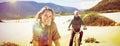 Carefree couple going on a bike ride on the beach Royalty Free Stock Photo