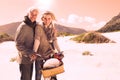 Carefree couple going on a bike ride and picnic on the beach Royalty Free Stock Photo