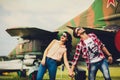 Carefree couple with toothy smile outdoors