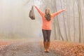 Carefree fashion woman relaxing in autumn park. Royalty Free Stock Photo