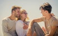 Carefree friends. True friendship. Being sincere with closest people. Friends relaxing on roof. Men and woman talking Royalty Free Stock Photo