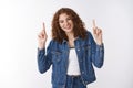 Carefree happy charming smiling european redhead girl freckles post-acne skin laughing joyfully raise hands pointing Royalty Free Stock Photo