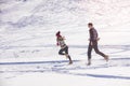 Carefree happy young couple having fun together in snow. Royalty Free Stock Photo