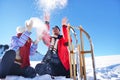 Carefree happy young couple having fun together in snow. Royalty Free Stock Photo