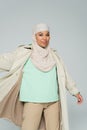 carefree multiracial woman in muslim hijab