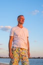 Carefree smiling man on the beach