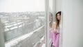 Carefree leisure bored teen girl sit windowsill