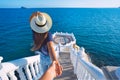 Carefree tourist woman in hat leading her boyfriend to the sea view. Follow me. Balcon del Mediterraneo, Benidorm, Spain Royalty Free Stock Photo