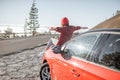 Woman tarveling by car on the mountain road Royalty Free Stock Photo