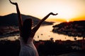 Carefree woman enjoying in nature,beautiful red sunset sunshine.Finding inner peace.Spiritual healing lifestyle.Enjoying peace,ant Royalty Free Stock Photo