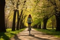 Carefree woman enjoys a bike ride through a lush green park embracing spring vitality