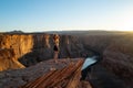 Carefree woman on Grand canyon. Canyon american national park. Female tourist enjoying view of Horseshoe bend, Arizona Royalty Free Stock Photo