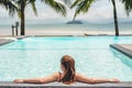 Carefree woman relaxation in swimming pool summer Holiday concept Royalty Free Stock Photo