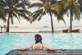 Carefree woman relaxation in swimming pool summer Holiday concept Royalty Free Stock Photo