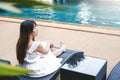 Carefree woman relaxation in swimming pool summer Holiday concept Royalty Free Stock Photo