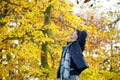 Carefree young man standing outside looking up Royalty Free Stock Photo