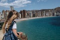 Carefree young tourist woman in sun hat enjoying sea view at Balcon Royalty Free Stock Photo