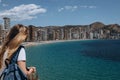 Carefree young tourist woman in sun hat enjoying sea view at Balcon Royalty Free Stock Photo