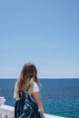 Carefree young tourist woman in sun hat enjoying sea view at Balcon Royalty Free Stock Photo