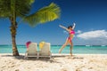 Carefree young woman relaxing on tropical beach. Isla Saona, Dominicana