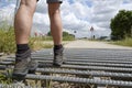 Careful walking across the cattle guard Royalty Free Stock Photo