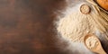 Bread-Making Essentials: Wheat, Yeast, and Rolling Pin Top View