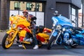 Carefully parking a colorful stylish motorcycle Royalty Free Stock Photo