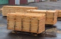 Carefully stacked stacks of wood boards at a woodworking plant, planking