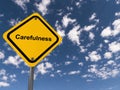 carefulness traffic sign on blue sky Royalty Free Stock Photo