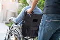 Caregiver help and care Asian senior or elderly old lady woman patient sitting on wheelchair at nursing hospital ward, healthy Royalty Free Stock Photo