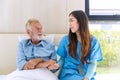 Caregiver nurse take care a Senior patient. Nurse helping senior Man Royalty Free Stock Photo