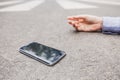 Careless pedestrian lying on the street